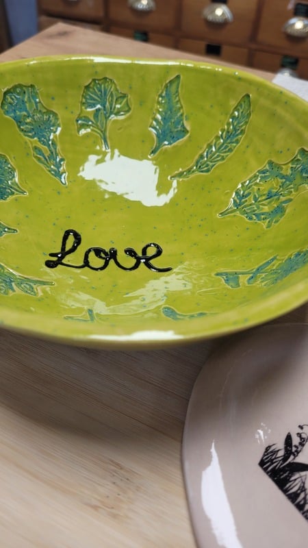 Bol vert avec l'inscription love